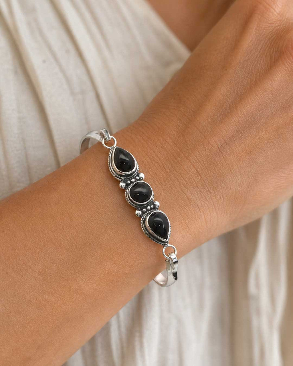 Black Onyx Three - Stone Bracelet — Guided by Inner Strength Engraved Cuff - Jewelry