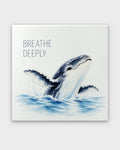 Breathe Deeply watercolor whale canvas wall art, front view showing breaching humpback whale in blue tones on white background
