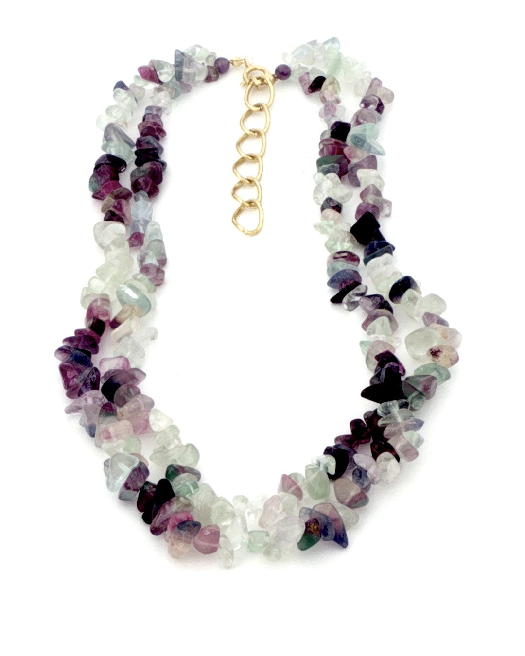 Fluorite chip double strand necklace laid flat on white with the gold tone clasp and extender chain at top