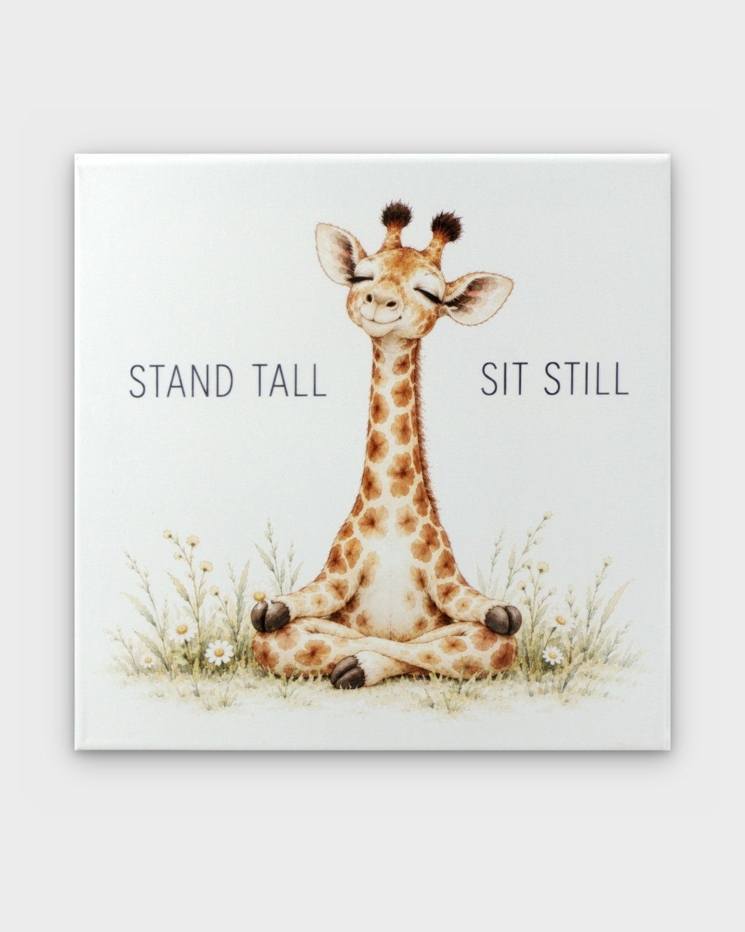 Meditating giraffe canvas wall art, front view showing watercolor illustration with Stand Tall Sit Still text and daisy wildflowers