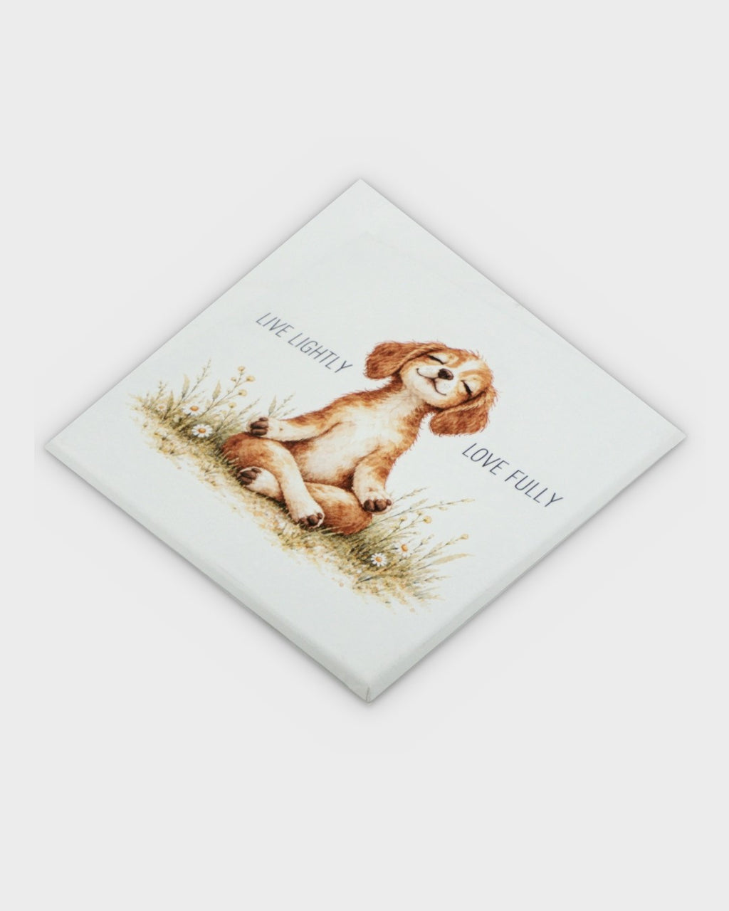 Meditating puppy canvas wall art, overhead diagonal view showing canvas wrap and full watercolor illustration of puppy in lotus pose