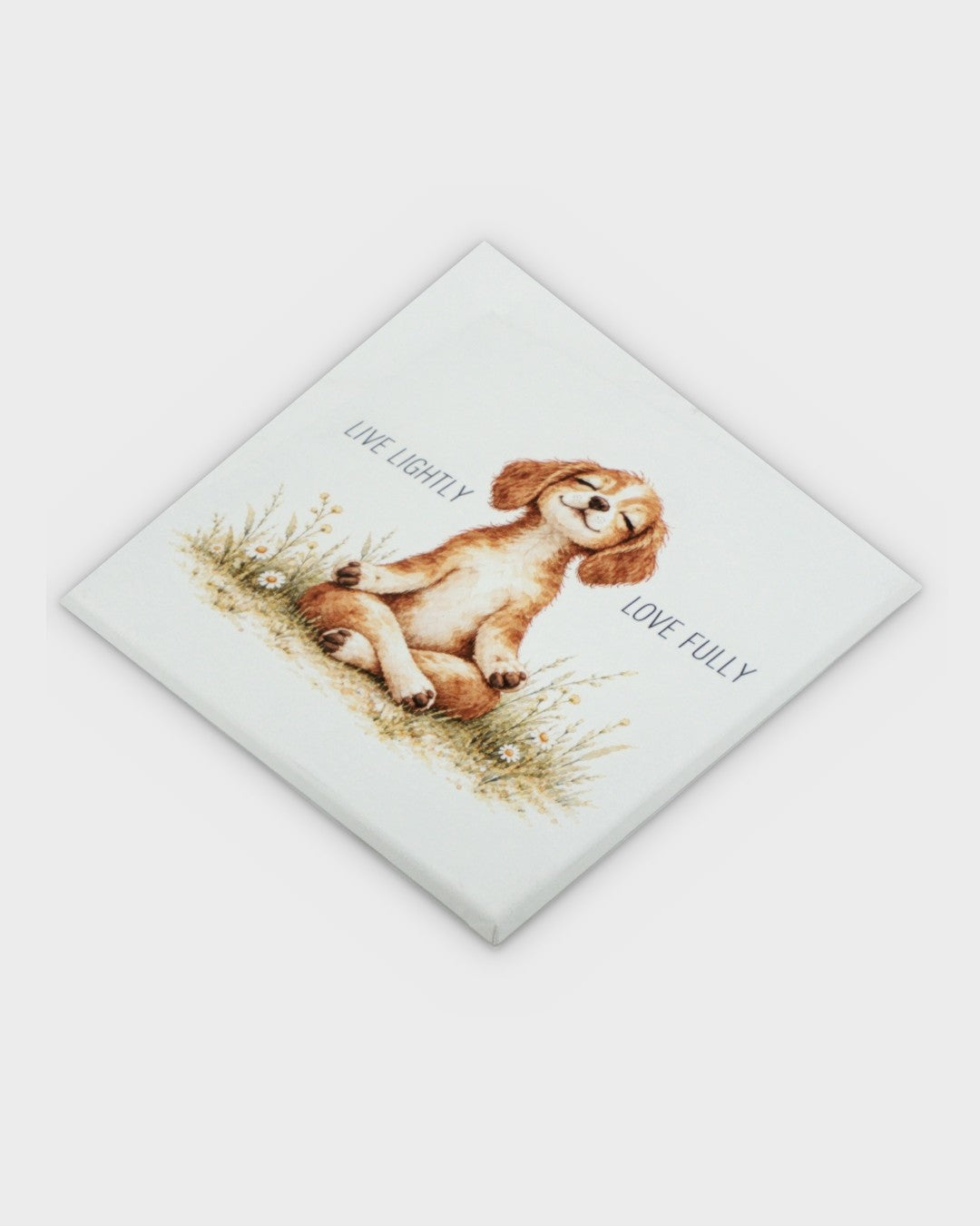 Meditating puppy canvas wall art, overhead diagonal view showing canvas wrap and full watercolor illustration of puppy in lotus pose