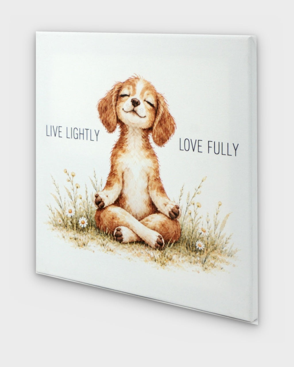 Meditating puppy canvas wall art, angled side view showing canvas depth and wrapped edges with watercolor spaniel illustration