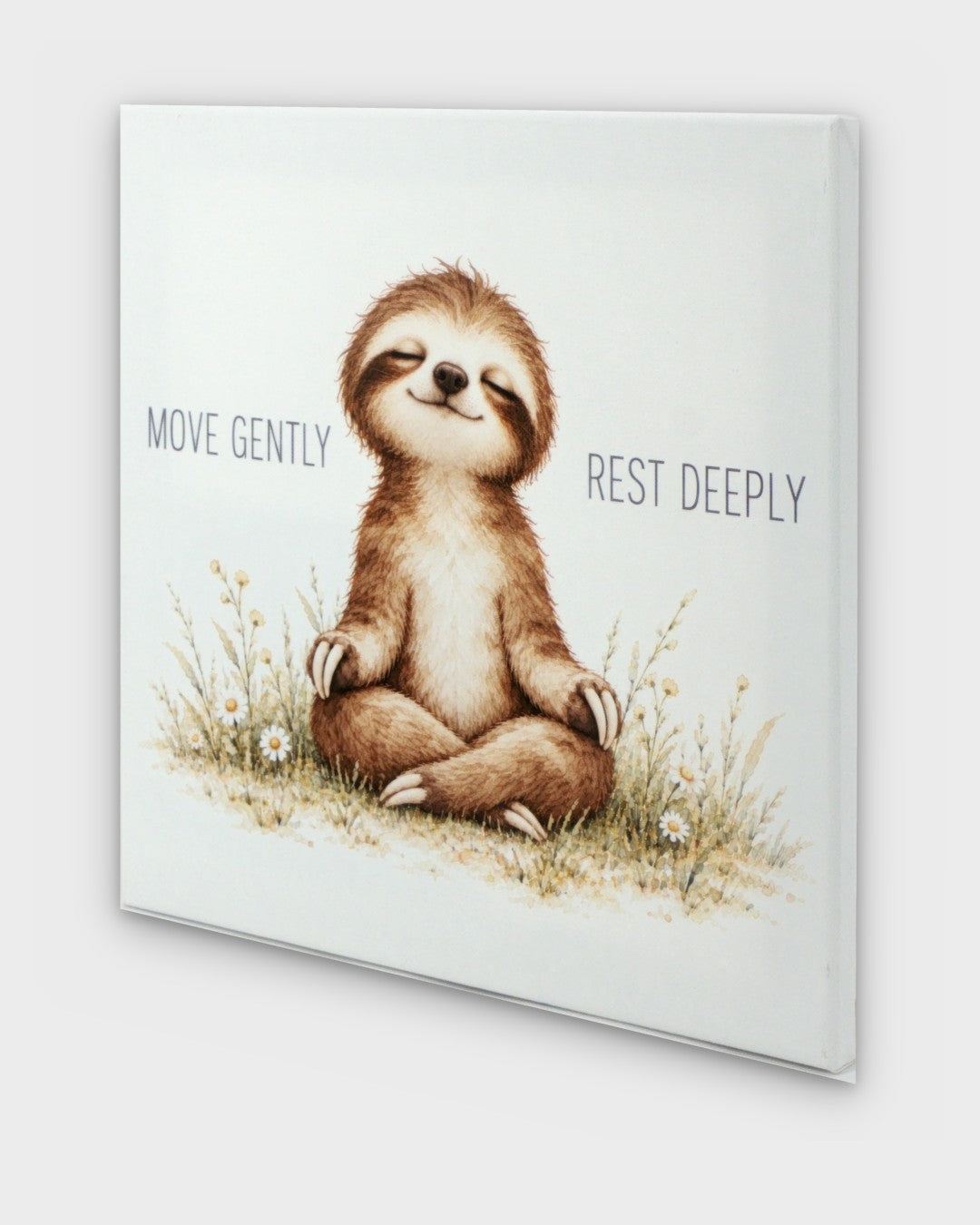 Meditating sloth canvas wall art at an angle showing canvas depth and wrapped edges with sloth among wildflowers