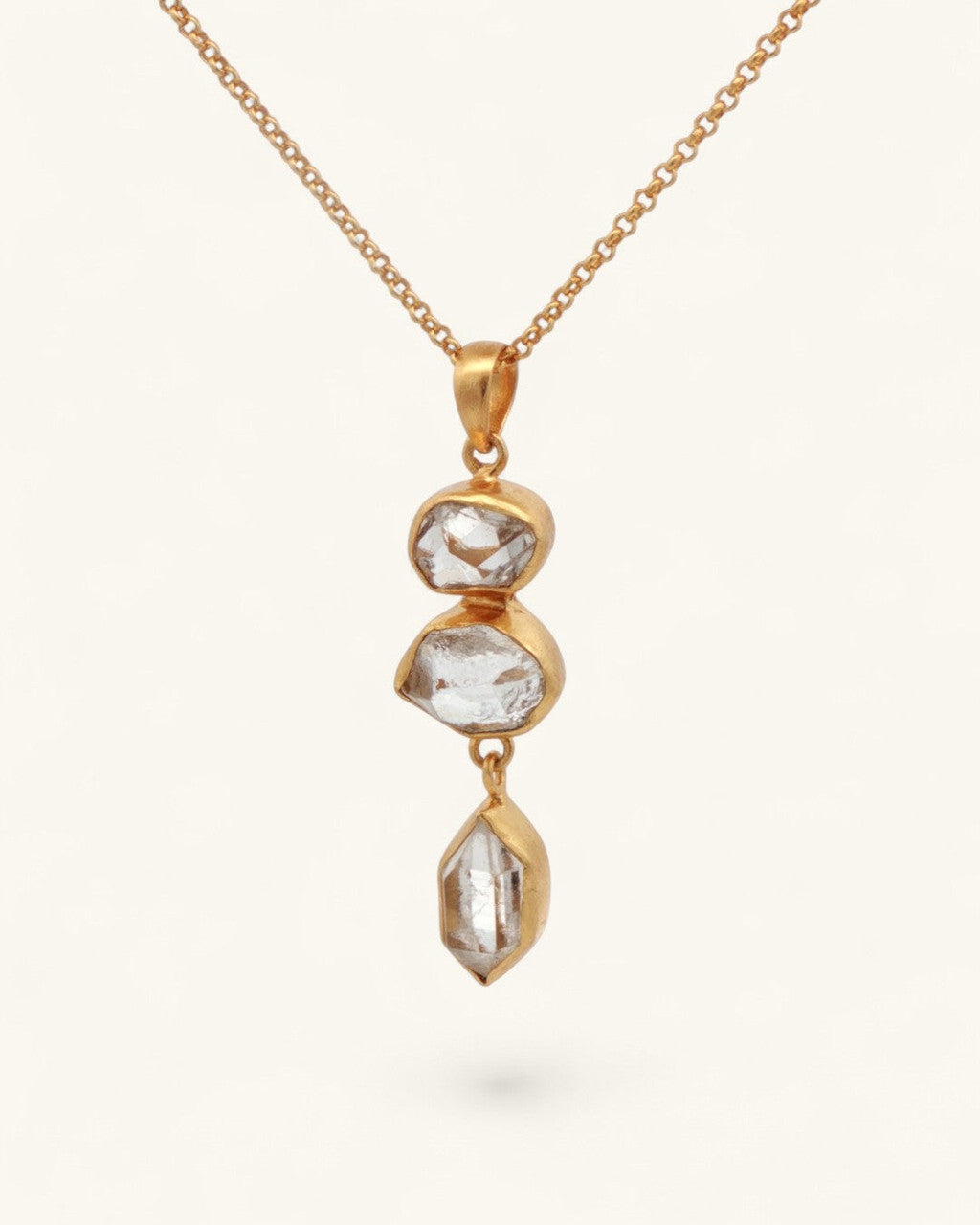 Triple Herkimer Quartz gold-plated pendant with gold cable chain, angled front view showing three stacked Herkimer stones